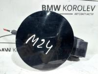 Лючок бензобака черный Hyundai I30 695102L000