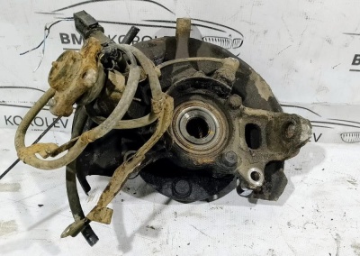  Кулак поворотный передний левый L200  L200 MR992377