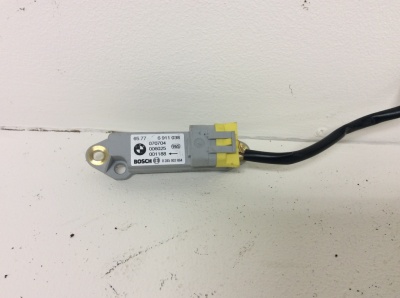 Датчик бокового удара  X5E53 65776911038