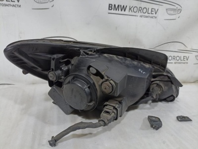 Фара левая рест.  Getz 921011C500