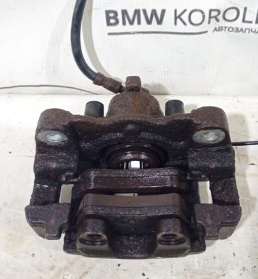 Суппорт тормозной задний левый Touareg 2002-2010 ОДНОПОРШНЕВОЙ   7L6615423  7L6615423